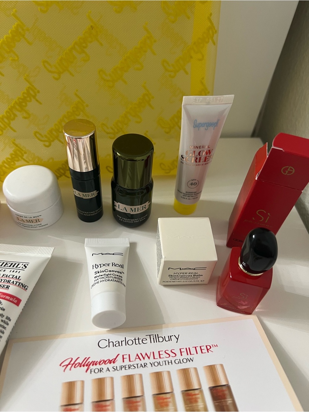 Supergoop! New Yellow Mesh Travel Pouch with mini skin care fsamples bundle. - Picture 5 of 8